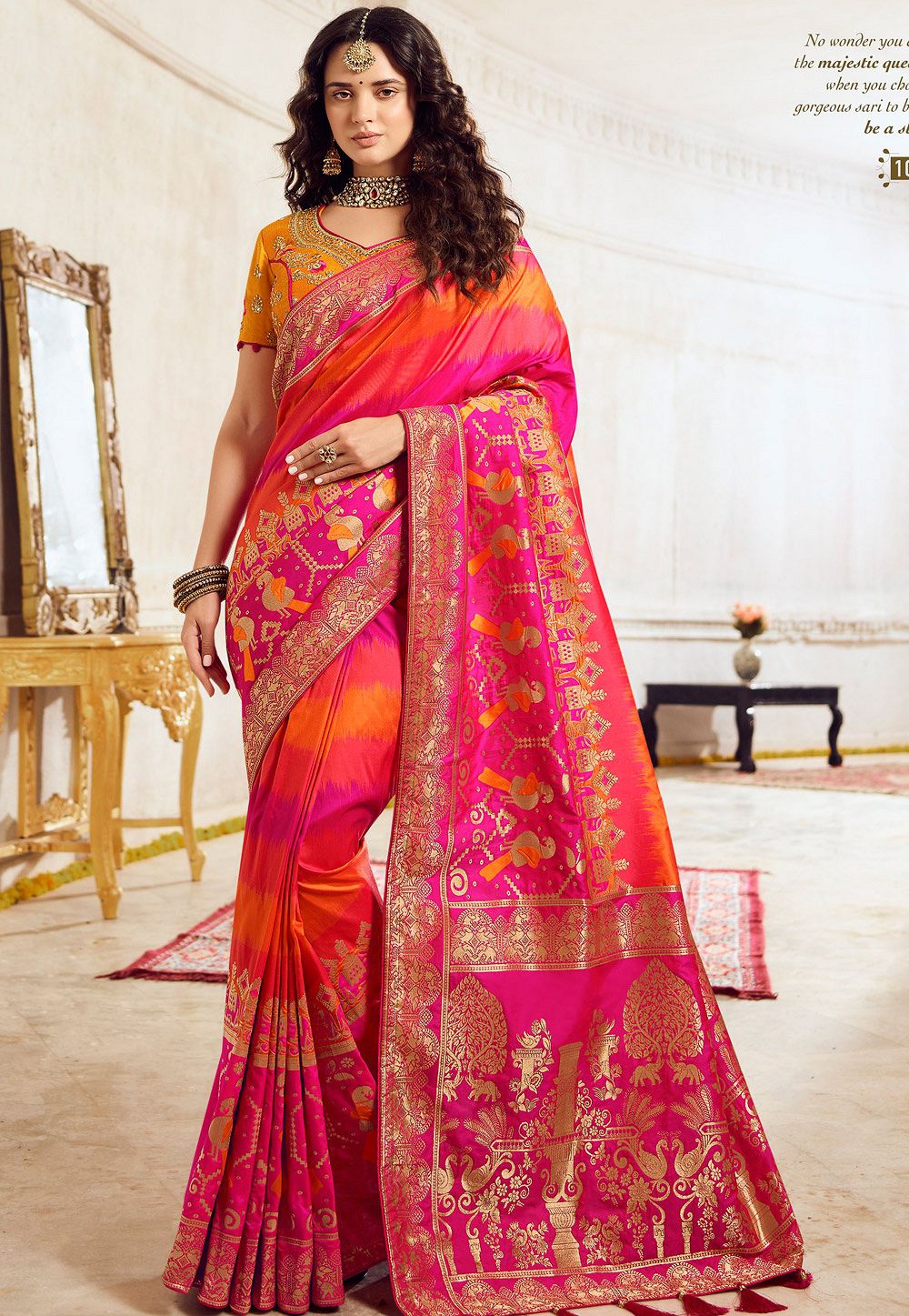 Flamboyant Orange Korian Silk Saree with Pink Blouse