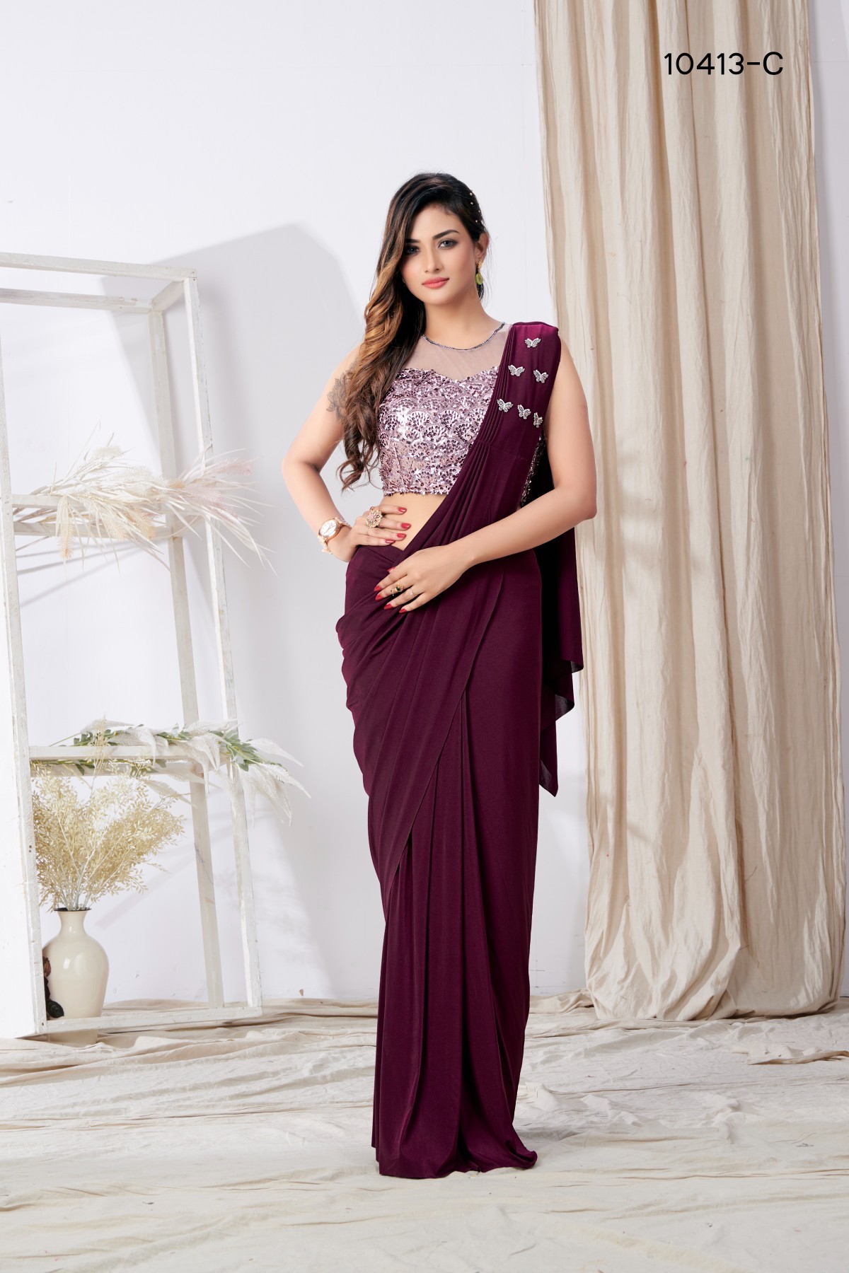 https://www.kollybollyethnics.com/image/catalog/data/15Mar2022/Wine-sequins-work-lycra-readymade-saree-10413c.jpg