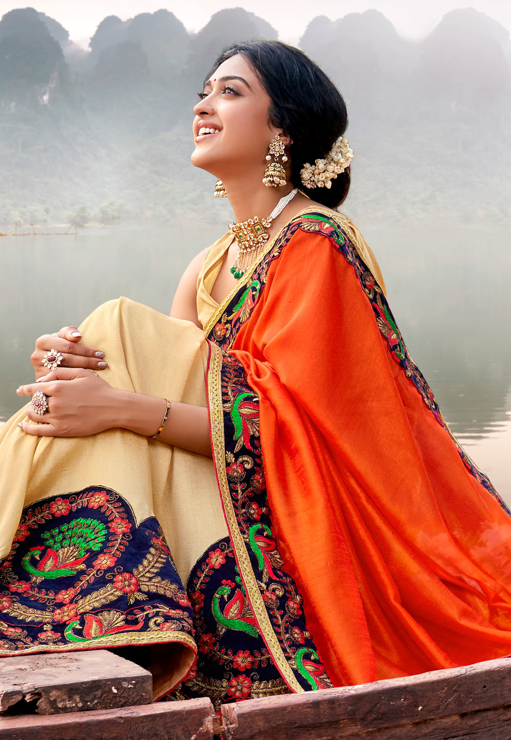 Vimala Raman poses in a multi-coloured half-saree for a clothing brand!