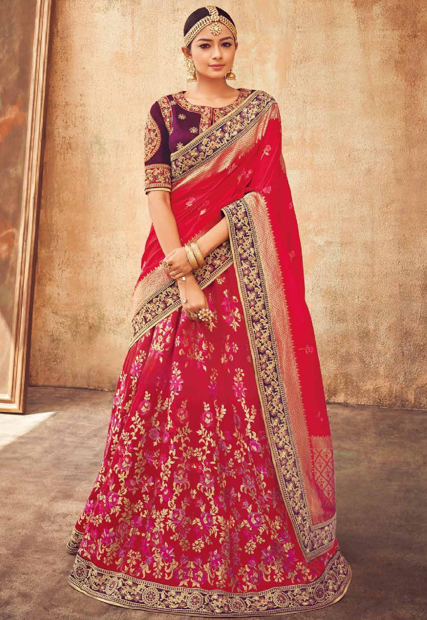 red and purple bridal lehenga