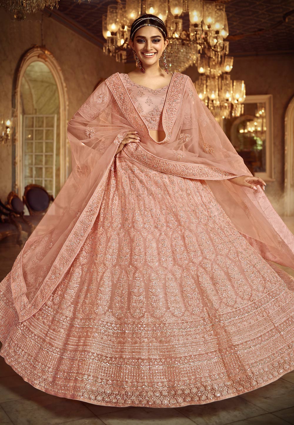 Peach net circular engagement lehenga ...