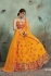 Mustuard color net sequins wedding lehenga