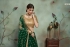 Dark green net sequins wedding lehenga