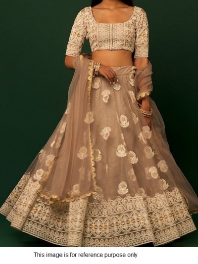 Bollywood model beige lucknowi lehenga