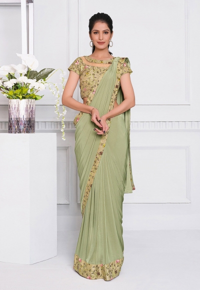 Light green lycra designer saree 21507