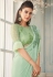 Light green silk ruffle border saree 7109