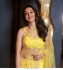 Bollywood model Yellow Net sequins saree