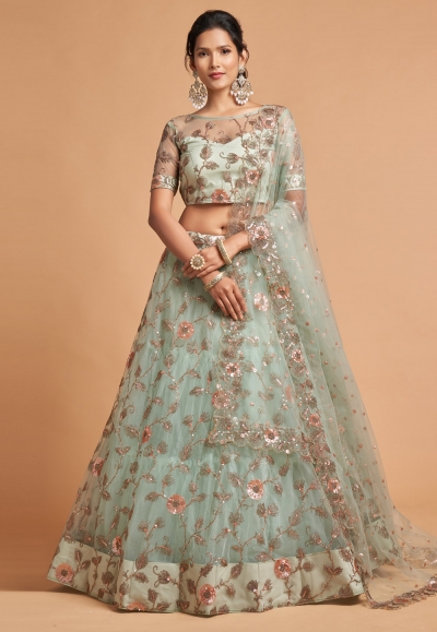 Pista green soft net circular lehenga choli 7314