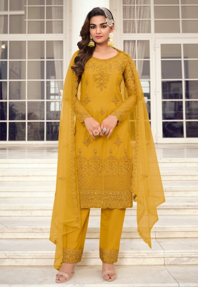 Net embroidered pant style suit in Mustard colour 3403