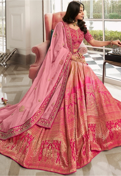 Woven Jacquard silk lehenga choli in Peach and Pink color