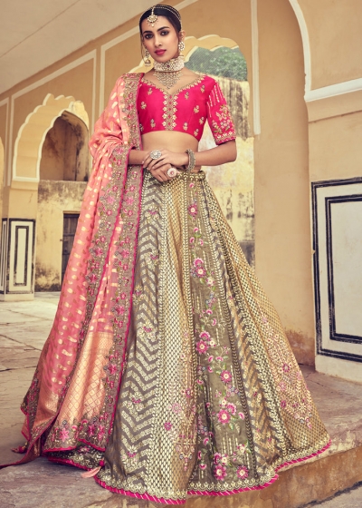 Woven Zari Banarasi silk lehenga choli in Beige and Pink