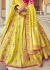 Woven Zari Banarasi silk lehenga choli in Yellow and Pink