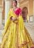 Woven Zari Banarasi silk lehenga choli in Yellow and Pink