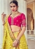 Woven Zari Banarasi silk lehenga choli in Yellow and Pink