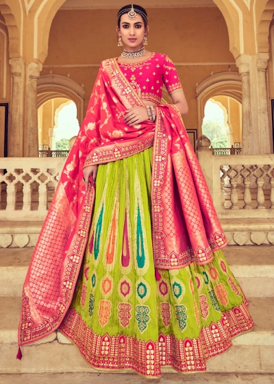 Woven Zari Banarasi silk lehenga choli in Green and Pink