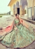 Woven Zari Banarasi silk lehenga choli in Pista Green and Peach