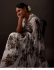 Bollywood model georgette brown and black floral print saree in white
