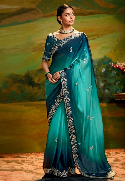 Turquoise organza half n half saree 5394