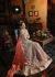Beige color netted wedding wear anarkali