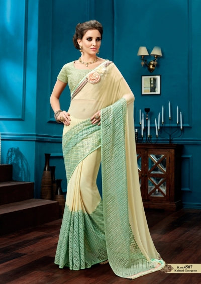 Cream and mint green fancy wedding wear saree