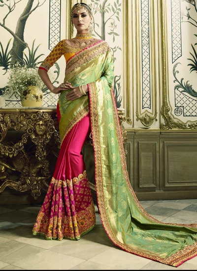 Pink and yellow silk crepe jacquard and art silk wedding wear saree