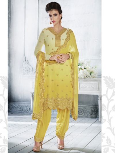 Yellow color shaded georgette wedding wear salwar kameez