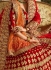 Red and orange silk velvet and net wedding lehenga choli