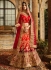 Red and maroon shaded silk velvet and net wedding lehenga choli