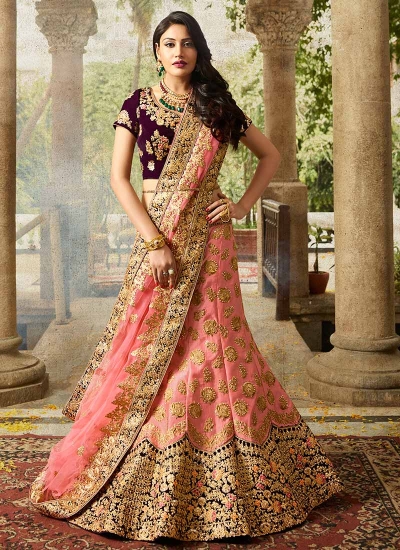 Pink color silk velvet and net wedding lehenga choli
