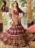 Purple color silk velvet and net wedding lehenga choli