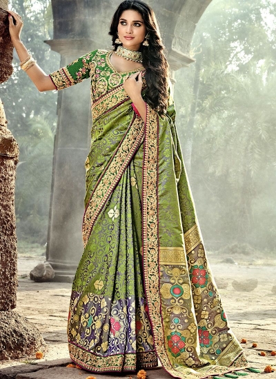 Green color Pure Banarasi Silk wedding wear saree