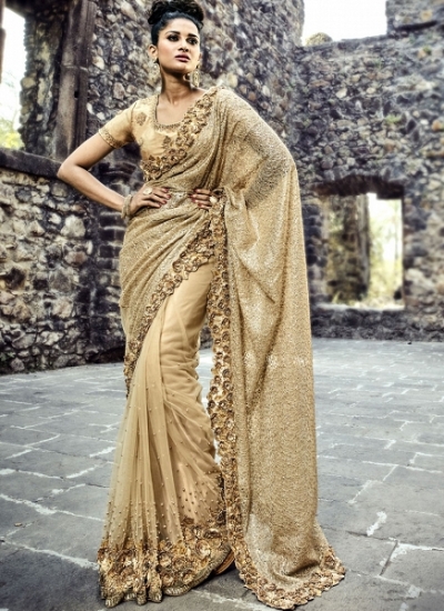 Gold color imported fabric and net wedding wear saree