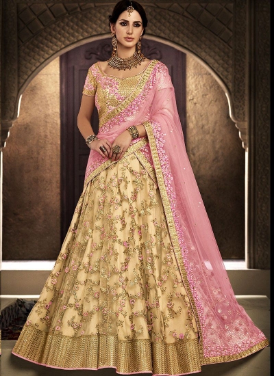 Peach and chiku color netted wedding lehenga