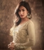 Sonal Chauhan Beige Net party wear anarkali kameez