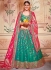 Rama green and pink Banarasi silk wedding lehenga choli