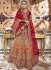 Orange red shaded velvet embroidered heavy designer Indian wedding lehenga choli 4706