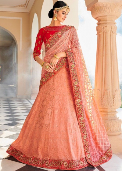 Peach color Lucknowi silk Indian wedding lehenga