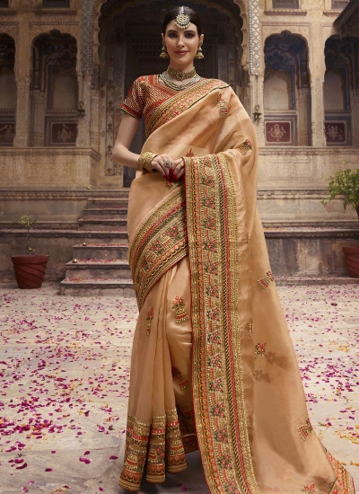 Beige and orange organza Indian wedding Saree