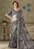 grey embroidered lycra saree with raw silk blouse 10704